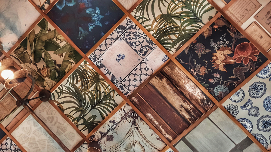 The ceiling of Coffeas cafe, Bangkok, decorated with wall papers from Pinpina